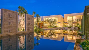 Outdoor pool, open 10:00 AM to 10:00 PM, pool umbrellas, pool loungers