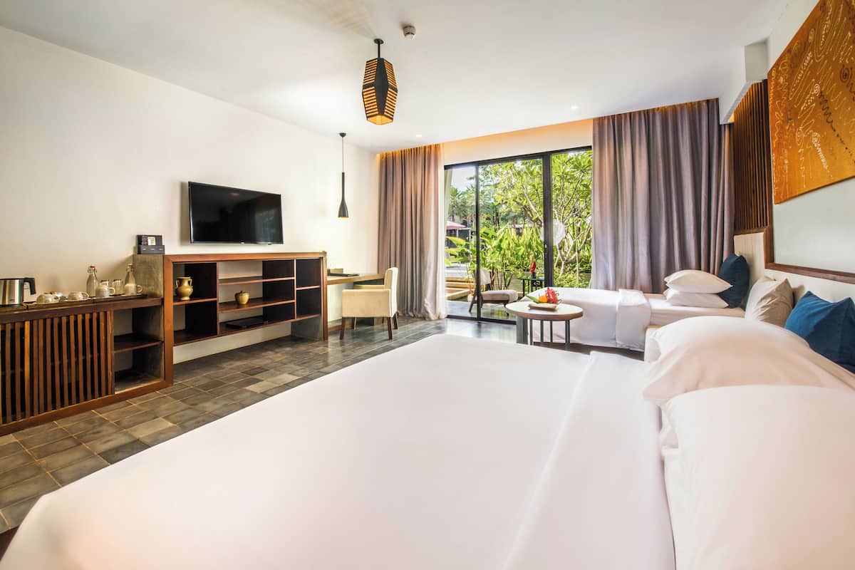 Family Suite Pool View | 1 bedroom, hypo-allergenic bedding, minibar, in-room safe