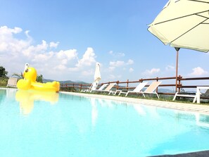 Outdoor pool, pool umbrellas, pool loungers
