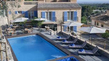 Outdoor pool, pool umbrellas, pool loungers