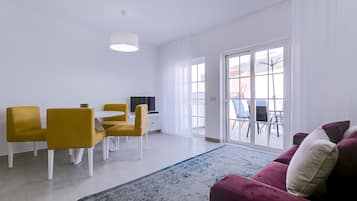 Penthouse, 1 Bedroom | Living room | Flat-screen TV