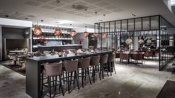 Breakfast, lunch, dinner served; local and international cuisine