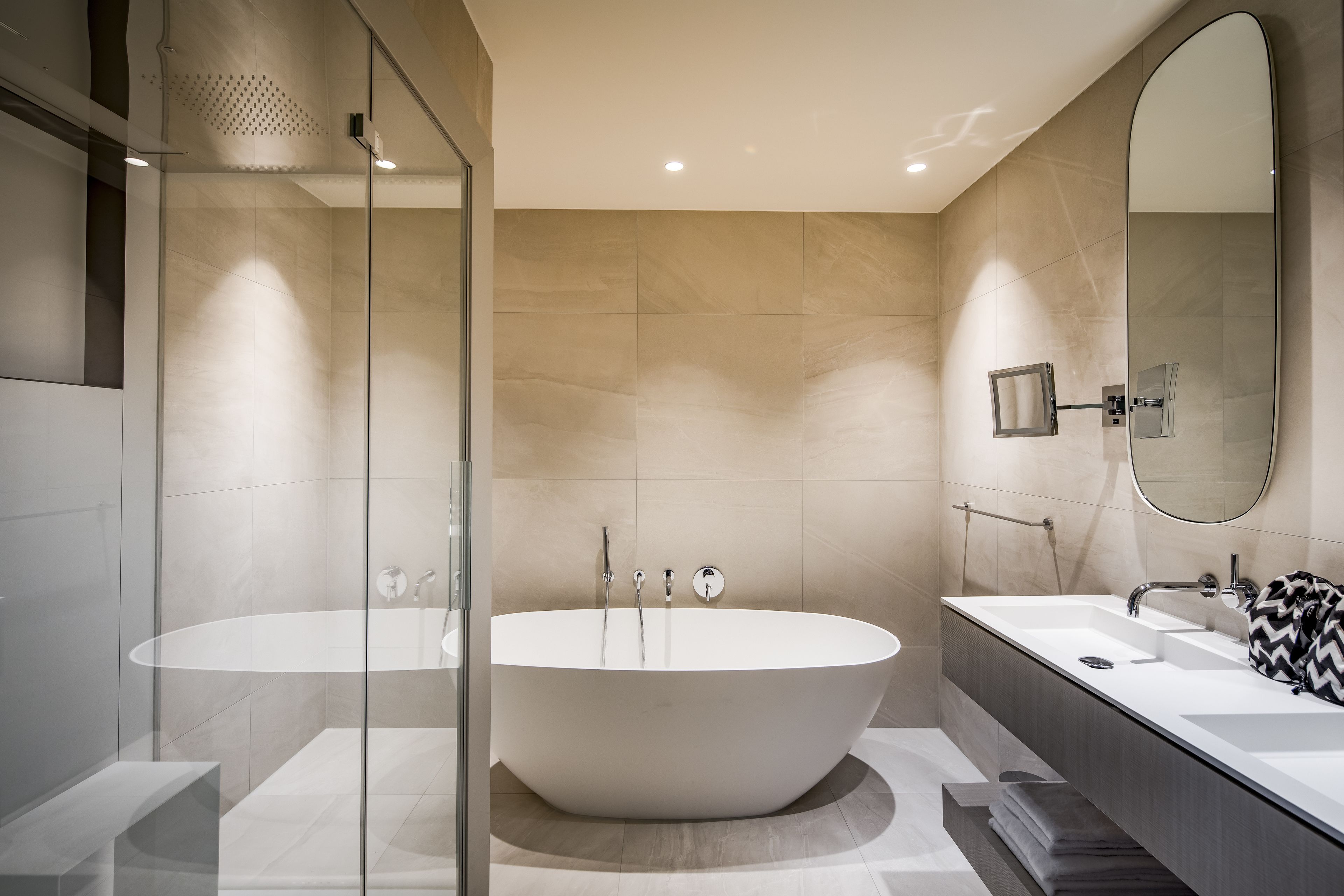 suite | bathroom | separate bathtub and shower, deep-soaking bathtub, rainfall showerhead