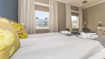 Premium bedding, desk, soundproofing, iron/ironing board