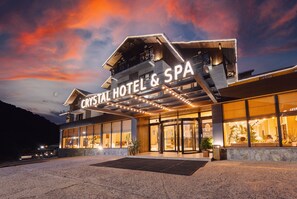 A hotel with a modern design, featuring a prominent sign that reads "Crystal Hotel & Spa." - Hotel and SPA Crystal (Borjomi)