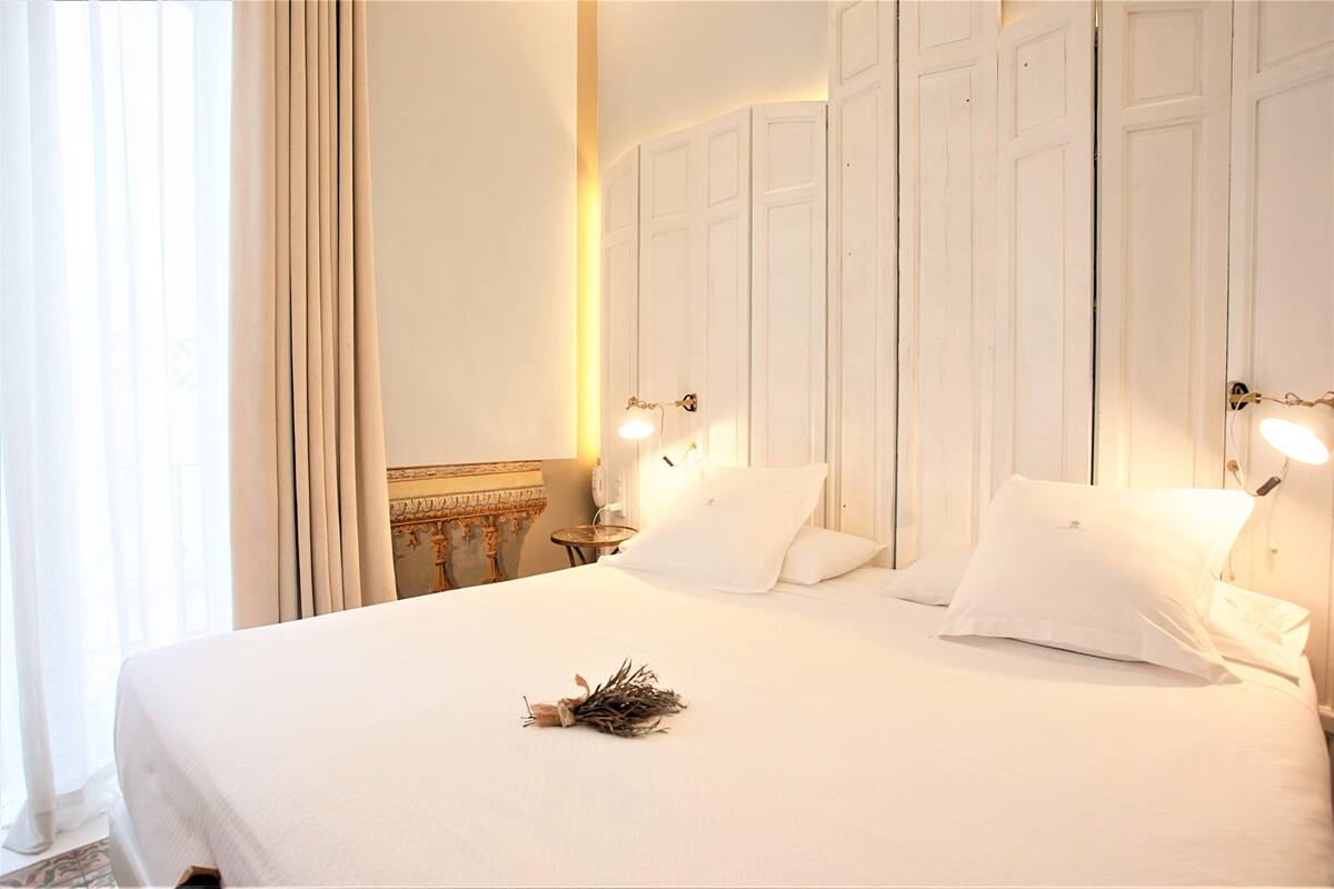 Premium bedding, down comforters, Select Comfort beds, minibar