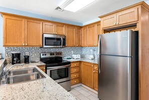 Beachfront 2 Bedroom Condo | Private kitchen | Microwave, coffee/tea maker