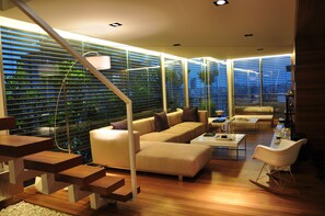 Deluxe Duplex, 2 Bedrooms, Terrace, City View | Living room | Flat-screen TV