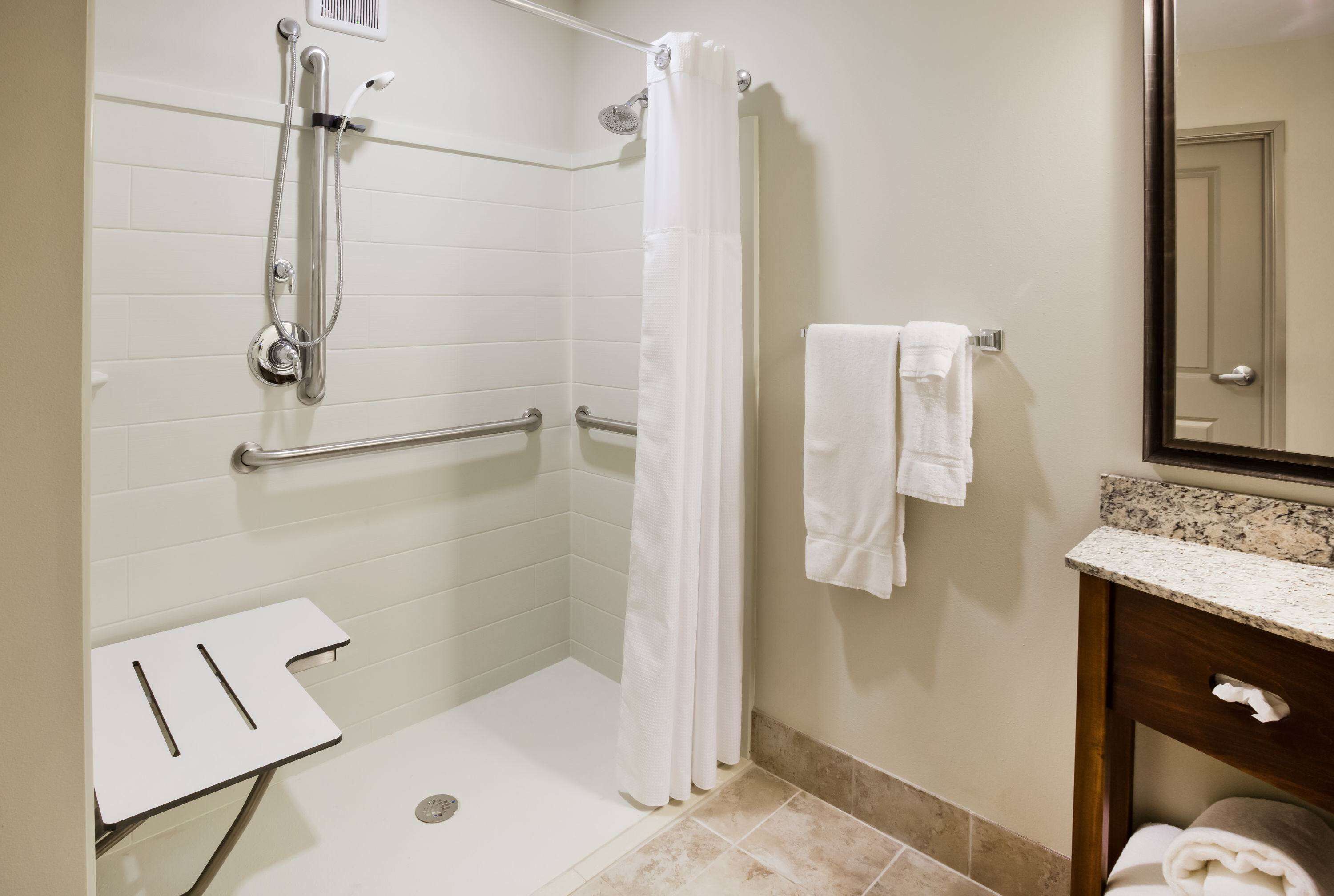 combined shower/bathtub, free toiletries, hair dryer, towels