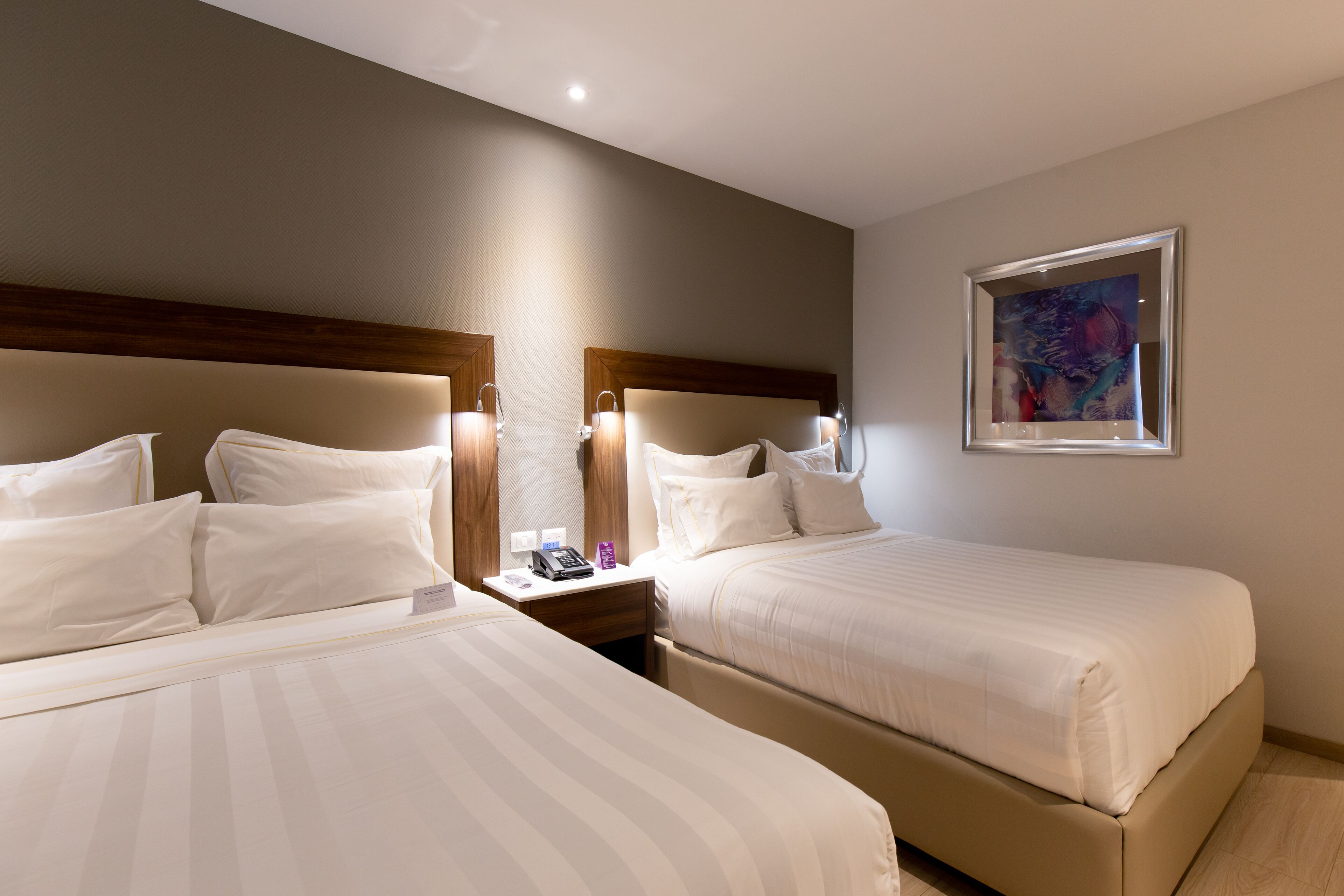 deluxe double room, 2 queen beds | 1 bedroom, in-room safe, desk, laptop workspace