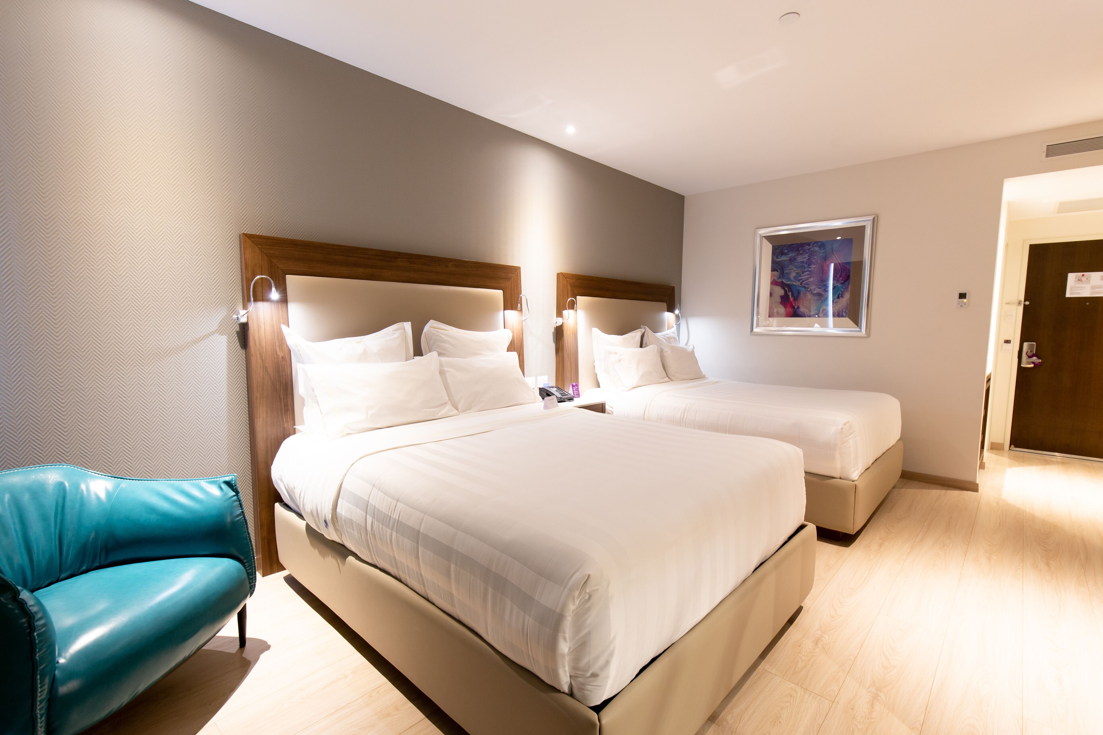 deluxe double room, 2 queen beds | 1 bedroom, in-room safe, desk, laptop workspace