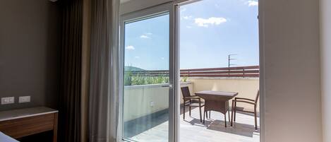 Deluxe Room, 1 King Bed, Terrace | Balcony