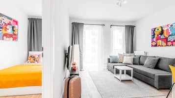 Apartamento clásico (Hollywood) | Zona de estar | Televisión LED de 50 pulgadas con canales por cable, una televisión