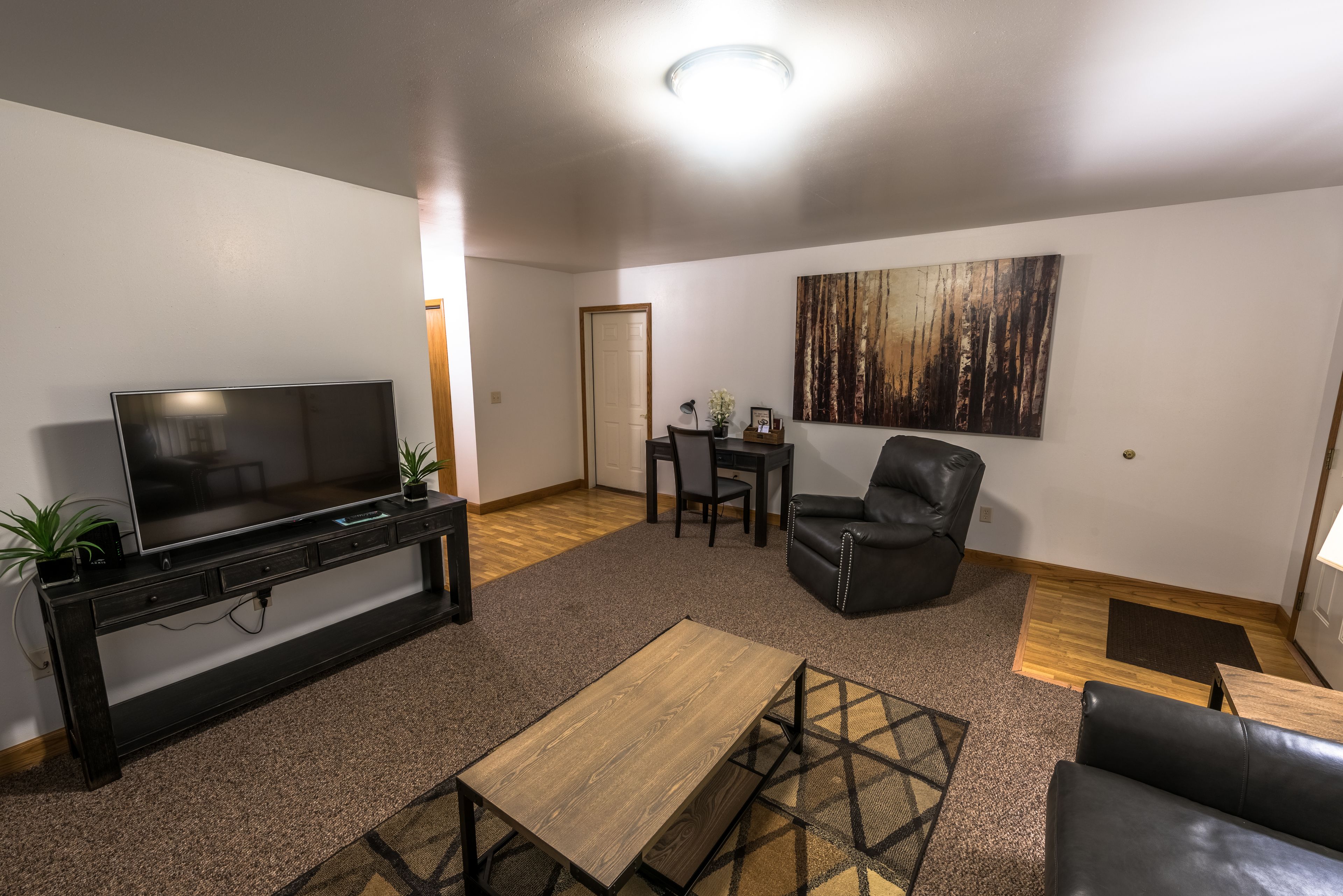 2 bedroom, 2 queen village suite | living room | flat-screen tv