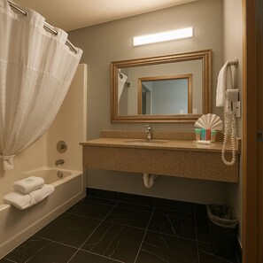 Deluxe Room, Multiple Beds (Deluxe Family Suite) | Bathroom | Combined shower/tub, free toiletries, hair dryer, towels