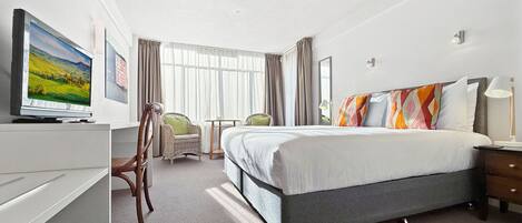 Studio | 1 bedroom, in-room safe, desk, iron/ironing board