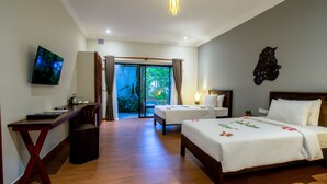 A hotel room with two beds, a desk, a TV, and a view of the outdoors. - GZ Angkor Boutique (Siem Reap)