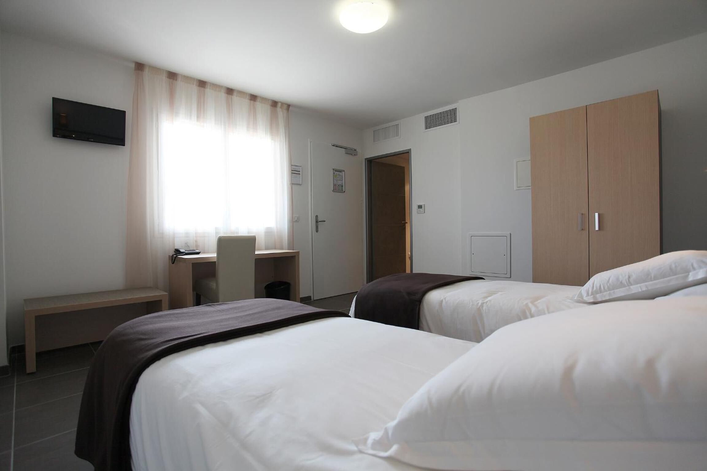 premium bedding, desk, soundproofing, free cots/infant beds