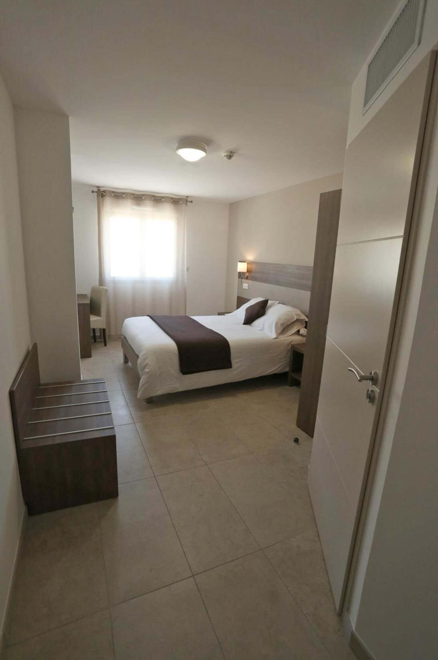 premium bedding, desk, soundproofing, free cots/infant beds