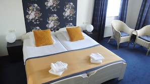 Desk, blackout curtains, free WiFi, bed sheets
