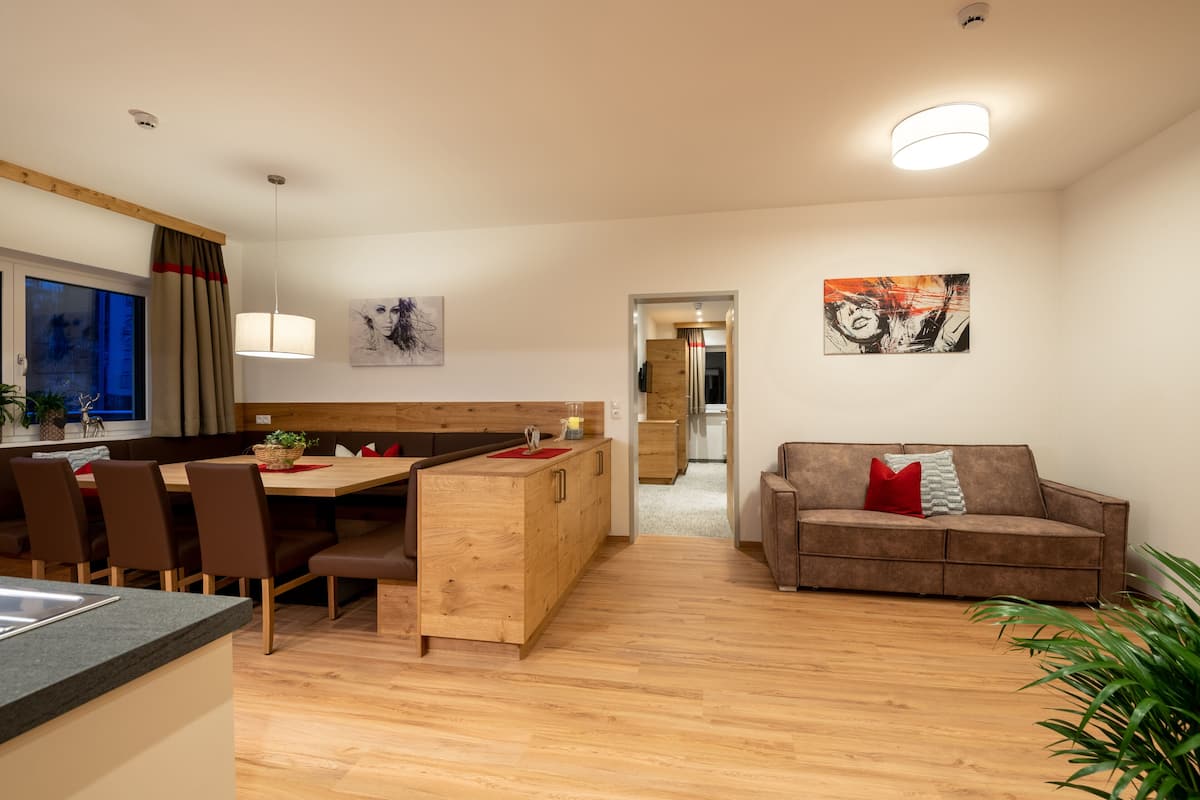 Deluxe Apartment, 3 Bedrooms, Terrace, Ground Floor (cleaning fee 180 EUR) | Living area | 32-inch LCD TV with cable channels, TV