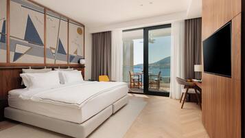 Kamar Comfort, teras, pemandangan laut | Minibar, brankas, kedap suara, dan Wi-Fi gratis