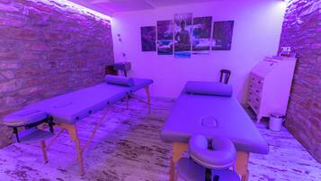 Relax in this serene space with two massage tables and a calming ambiance.