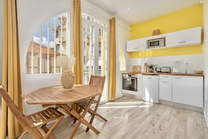 Deluxe Apartment | Living area | 50-inch flat-screen TV with digital channels, TV - Foyal Suites (Fort-de-France)