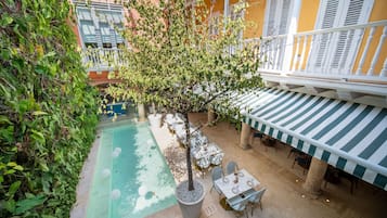 Outdoor pool, open 8:00 AM to 7:00 PM, free pool cabanas, pool umbrellas