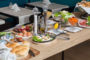 Daily buffet breakfast (EUR 15 per person)