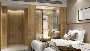 A modern hotel room with a wooden wardrobe, a large mirror, a bed with white bedding and decorative pillows, and a framed artwork on the wall. - Days Inn Fuzhou Woer (Fuzhou)