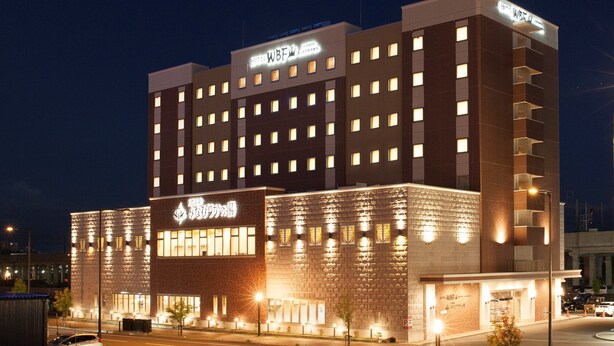 A multi-story hotel with a prominent sign for 'WBF' and 'Hotel WBF'. - Hotel WBF Grande Asahikawa (Asahikawa)