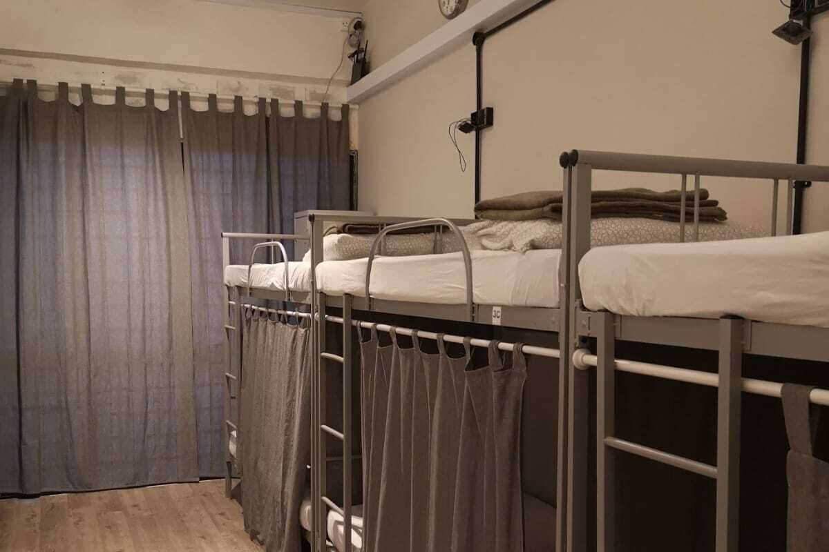 Single Bed in Deluxe 8-Beds Dormitory | Iron/ironing board, free WiFi, bed sheets
