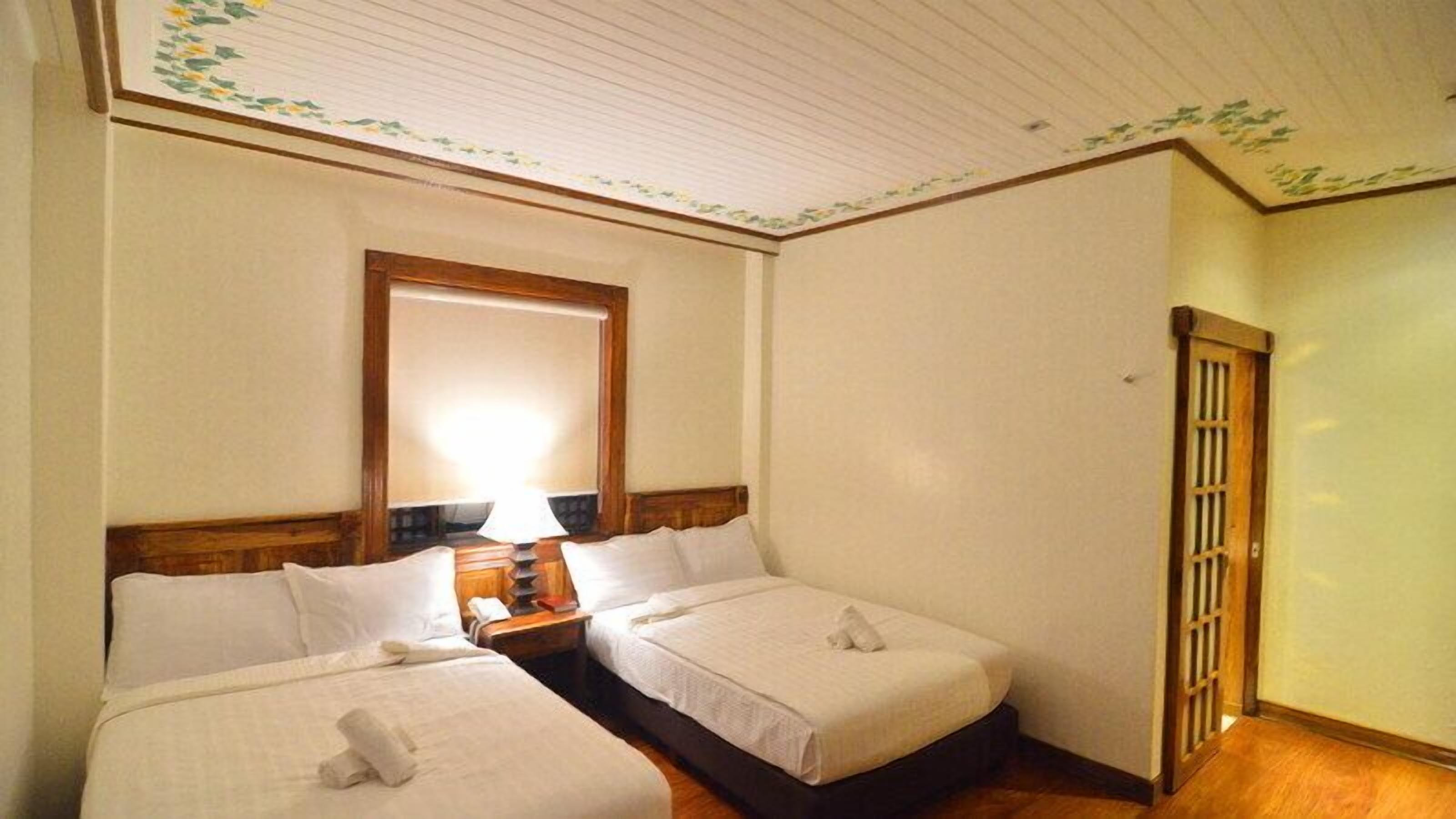 deluxe room, 2 queen beds | in-room safe, desk, rollaway beds, free wifi