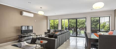 House, 4 Bedrooms, 2 Bathrooms | Living area | Flat-screen TV, DVD player