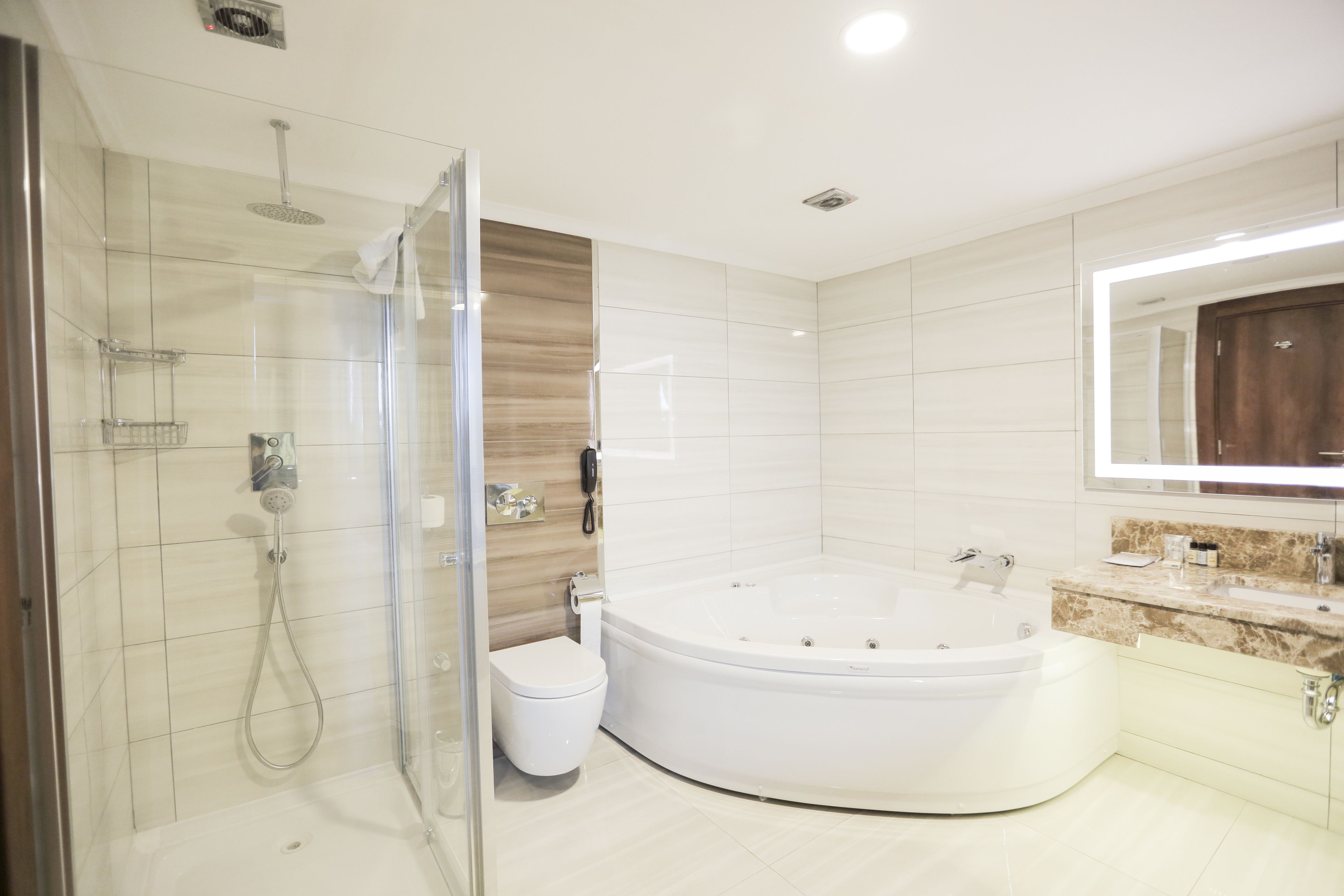 Suite | Bathroom | Deep-soaking bathtub, free toiletries, hair dryer, bathrobes