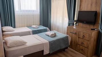 Standard Triple Room | Premium bedding, minibar, in-room safe, desk