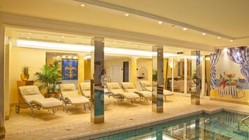 Indoor pool, outdoor pool, pool umbrellas, pool loungers