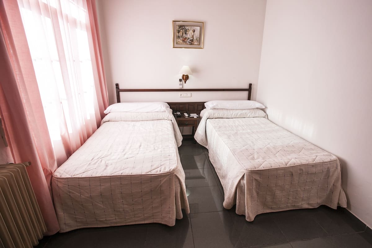 Copriletto in piuma, minibar, Wi-Fi gratuito, lenzuola