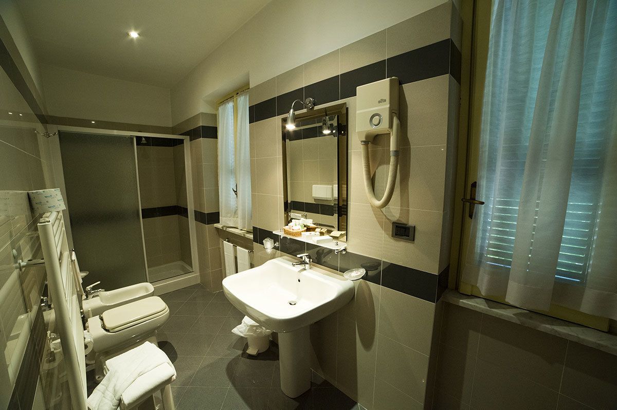 free toiletries, hair dryer, slippers, towels