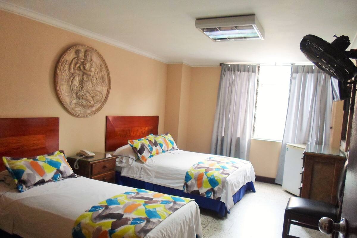 Chambre Triple | Minibar, fer et planche à repasser, Wi-Fi gratuit