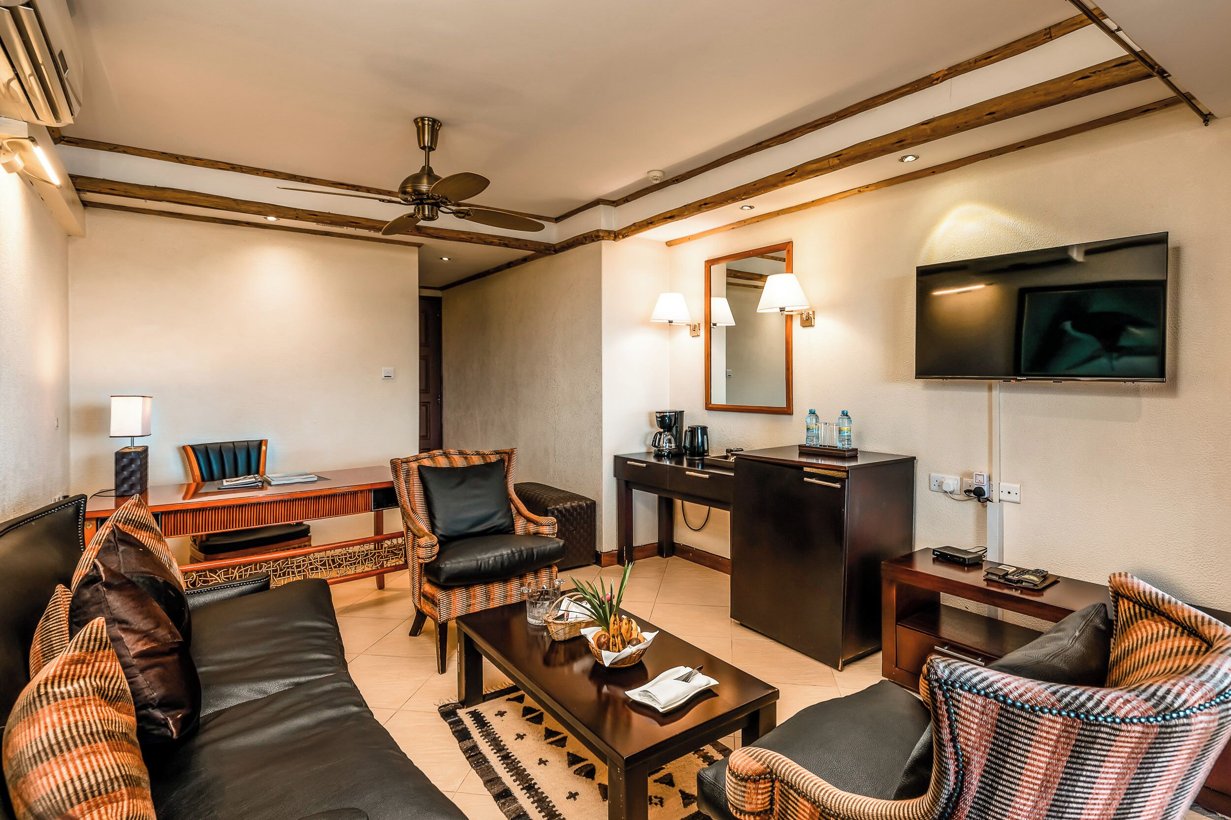 Superior Room | Living area | 42-inch flat-screen TV with satellite channels