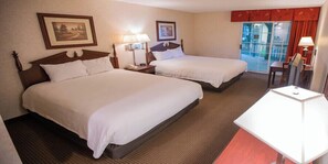Pillow-top beds, desk, laptop workspace, blackout curtains