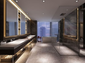 A modern bathroom with a dual sink vanity, a large mirror, and a glass-enclosed shower area. - Crowne Plaza Kunshan by IHG (Suzhou)