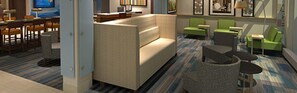 A modern hotel lobby with a sofa, chairs, a reception desk, and a patterned carpet. - Holiday Inn Express & Suites McAllen - Medical Center Area by IHG (McAllen)