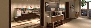 A modern kitchen with a coffee machine, a microwave, and a refrigerator. - Holiday Inn Express & Suites McAllen - Medical Center Area by IHG (McAllen)