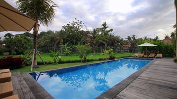 Outdoor pool, pool umbrellas, pool loungers