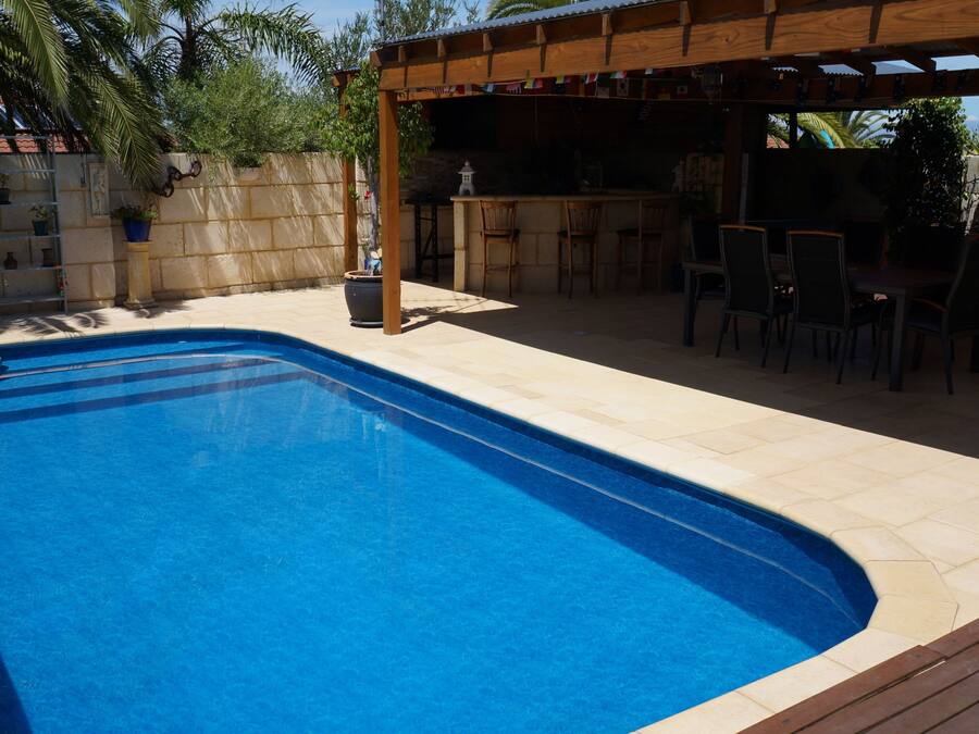Outdoor pool, pool umbrellas, sun loungers