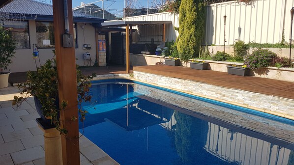 Outdoor pool, pool umbrellas, sun loungers