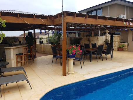 Outdoor pool, pool umbrellas, sun loungers